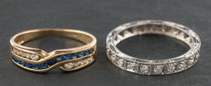 Two half-eternity rings, including an 18ct gold, round, brilliant-cut diamond half eternity ring,