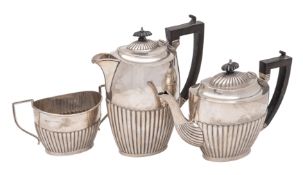 A George V three- piece silver tea service, maker Joseph Gloster Ltd,
