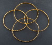 Four bangles, inner diameter ca. 6.3cm, total weight ca. 43gms.