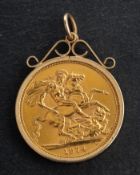 An Elizabeth II Sovereign coin, dated 1974, in a 9ct gold pendant setting,