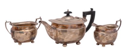 A George V silver three-piece tea service, makers Northern Goldsmiths Co.