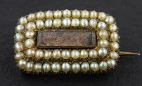 An early Victorian, silver gilt, hairwork and seed pearl sentimental brooch,