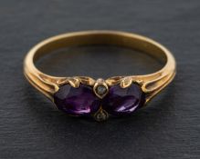 An oval, mixed-cut amethyst and rose-cut diamond ring,