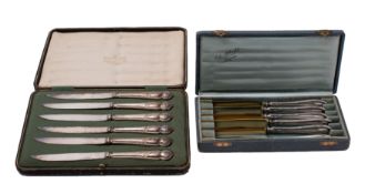 A set of Swiss silver handled dessert or fruit knives with gilt blades and reeded and foliate