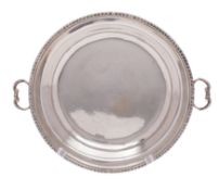 A George III silver circular twin-handled serving dish, maker probably George Hindmarsh,