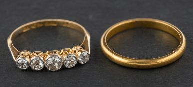 Two gold rings, including an old-cut diamond, five-stone ring, total estimated diamond weight ca. 0.