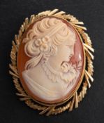 A 9ct gold, shell cameo brooch/ pendant, depicting the bust of a lady in profile,