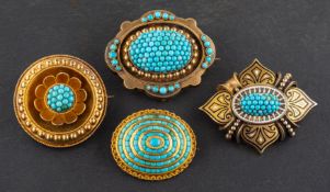 Four turquoise brooches, including a black and white enamel quatrefoil brooch; a circular,