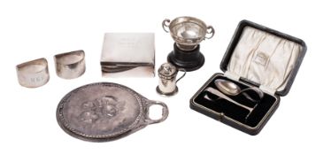 An Edward VII silver backed hand mirror, maker William Comyns,