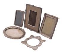 A silver oval photograph frame, another rectangular, both Birmingham 1918,
