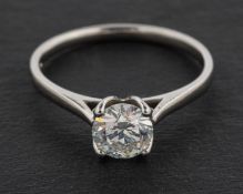 A platinum, round, brilliant-cut diamond, single-stone ring, estimated diamond weight ca. 0.