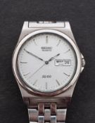 Seiko SQ100 a stainless steel gentleman's wristwatch the dial with raised baton numerals,