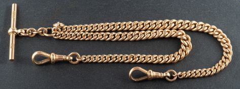 A 9ct gold, graduated, curb-link Albert watch chain, with dog clips at either end and a T-bar,