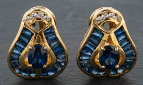 A pair of oval, mixed-cut and calibre-cut sapphire and diamond earrings,