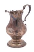 A George III silver pedestal cream jug, maker James Young, London, 1762 monogrammed,