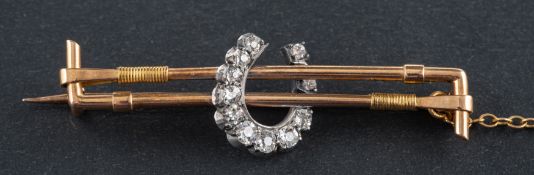 A bar brooch,