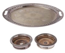 An Edward VII electroplated oval twin-handled tea tray,