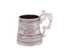 A Russian silver cup, maker Viktor Savinkov, Moscow 1873 of tapered tankard form with reeded bands,
