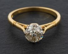 A round, brilliant-cut diamond, single-stone ring, estimated diamond weight ca. 0.