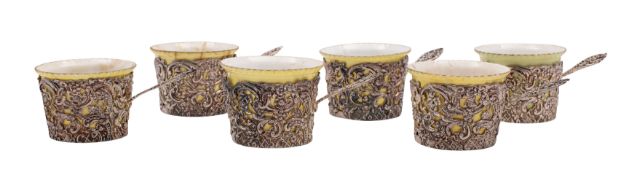 A set of six late Victorian silver demi-tasse cups, maker William Comyns,