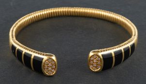 An Italian, onyx and single-cut diamond bangle, of 'gas pipe' design,