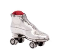 A rare Edward VII silver novelty pin cushion in the shape of a miniature roller skate,