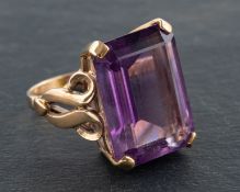 An octagonal, step-cut amethyst ring, estimated amethyst weight ca. 12.7cts, length of ring head ca.