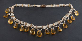 A late 19th/ early 20th century, four-row, seed pearl, choker necklace, with graduated oval,