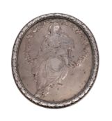 A plated oval cameo plaque depicting Madonna and Child in an arbour of flowers and foliage,