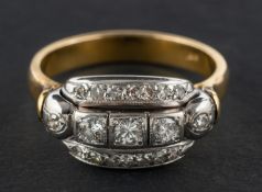 A single and round, brilliant-cut diamond, three-row ring, total estimated diamond weight ca. 0.