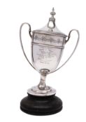 A George V silver twin-handled presentation cup and cover, makers Walker and Hall, Sheffield 1910,