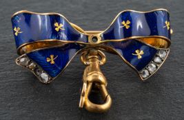 A blue enamel and rose-cut diamond bow brooch, with shamrock decoration and dog clip pendant,