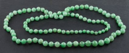 A graduated, single-row, jade bead necklace, diameter of beads ca. 5.7-9.6mms, total length ca.