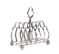 A Victorian silver seven bar toast rack, maker Charles Horner,