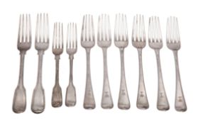 Six George III silver Hanoverian pattern table forks with armorial crests,