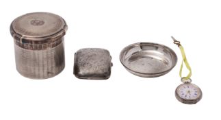A George V silver drum-shaped dressing table box, makers Goldsmiths and Silversmiths Co.