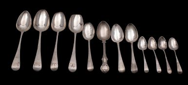 A collection of George III silver spoons to include a decorative spoon,