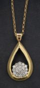 A pear-shaped, open pendant set with a circular, round, brilliant-cut diamond cluster,