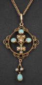 A cabochon-cut opal and seed pearl, openwork pendant, stamped '9CT',