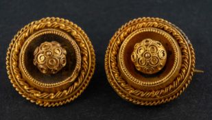 Two 19th century, circular, cannetille brooch/ pendants, diameter ca. 1.9cm, total weight ca. 8.