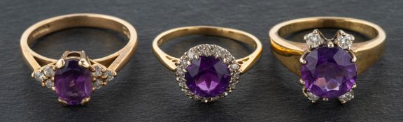 Three amethyst and diamond rings, including a 9ct gold,