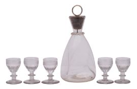 A late Victorian clear glass dimple decanter with silver mounted stopper,
