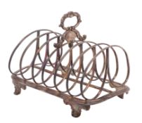 A George IV silver toast rack, maker Robert Hennell,