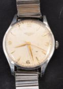 Longines, a gentleman's stainless-steel wristwatch the cream dial with baton and Arabic numerals,