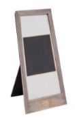 A George V Art Deco silver easel photograph frame, maker's mark worn, Birmingham,