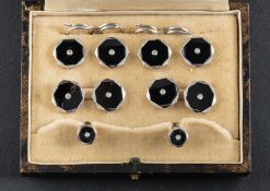 A single-cut diamond and onyx dress stud set, including a pair of cufflinks,