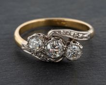 An old-cut diamond, three-stone ring, total estimated diamond weight ca.