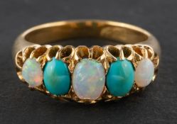An oval, cabochon-cut opal and turquoise, five-stone ring, stamped '18CT', length of ring head ca.