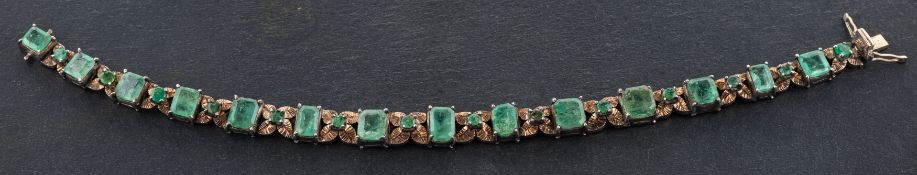 A round, mixed-cut and emerald-cut emerald bracelet,