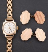 A Roamer 9ct gold ladies wristwatch, the dial with raised baton numerals and baton hands,